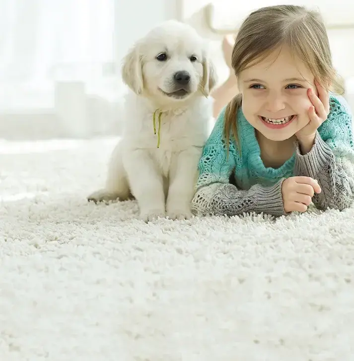Girl and Dog on White Carpet