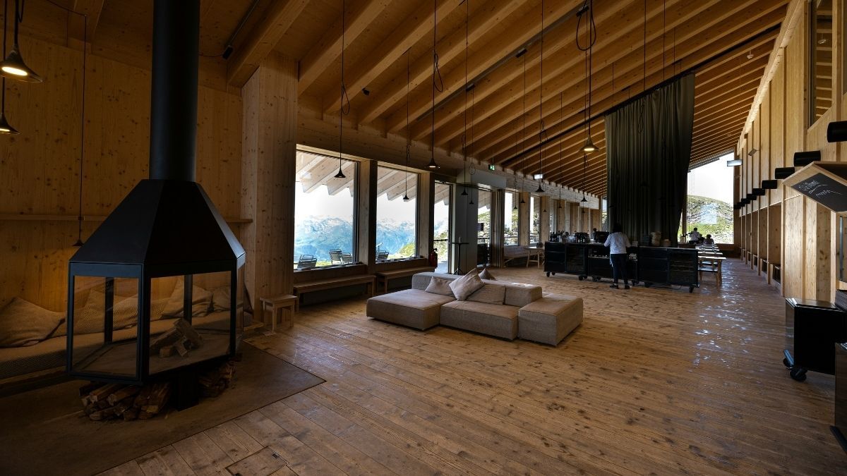 Open interior with fireplace and classic rustic timber flooring